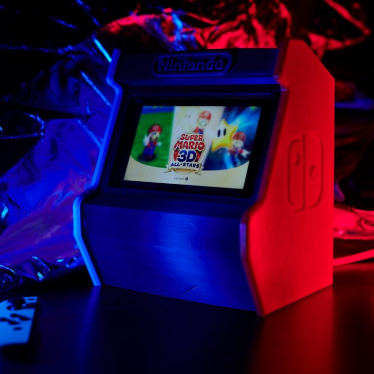 Retro arcade machine displayed with colourful lighting and games on screen.